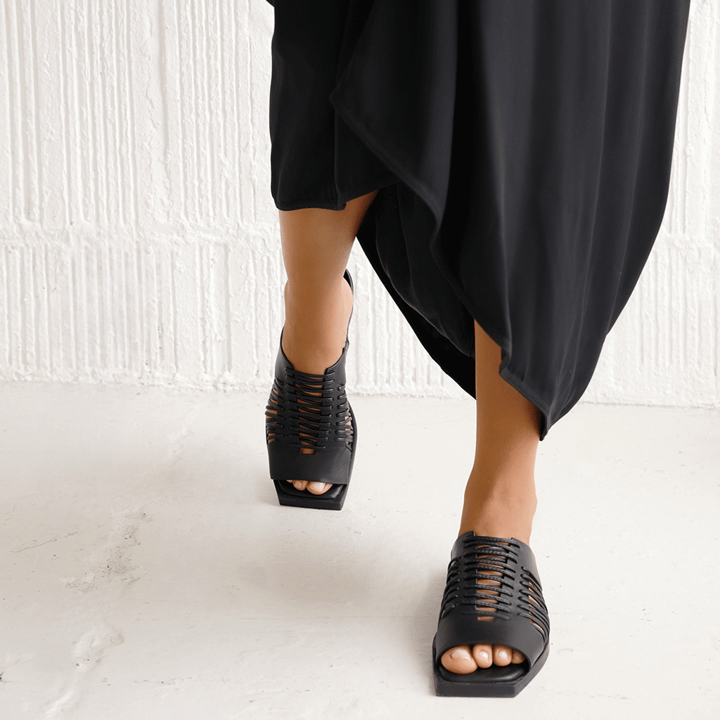 Daniella Shevel Gia leather woven slide in black walking leather details