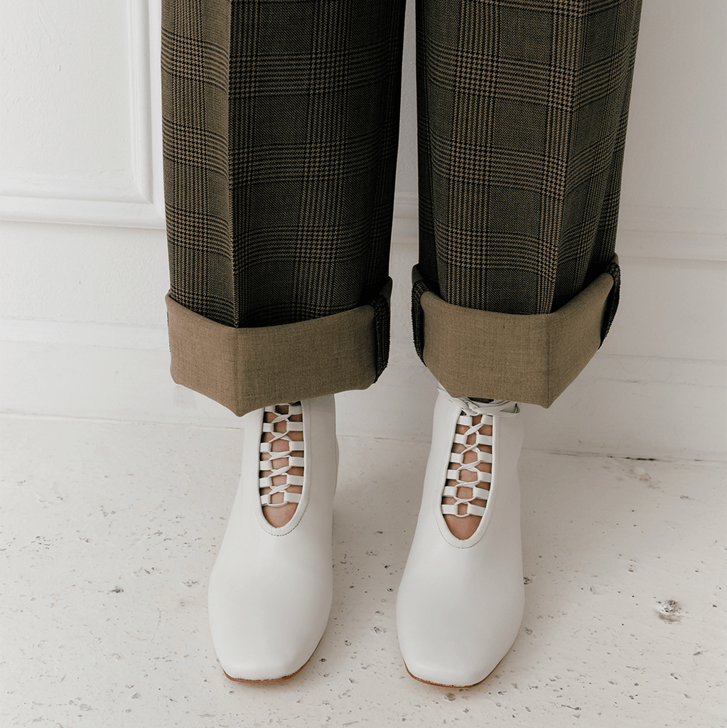 Daniella Shevel Cleo Lace Up Bootie in White with lace up details