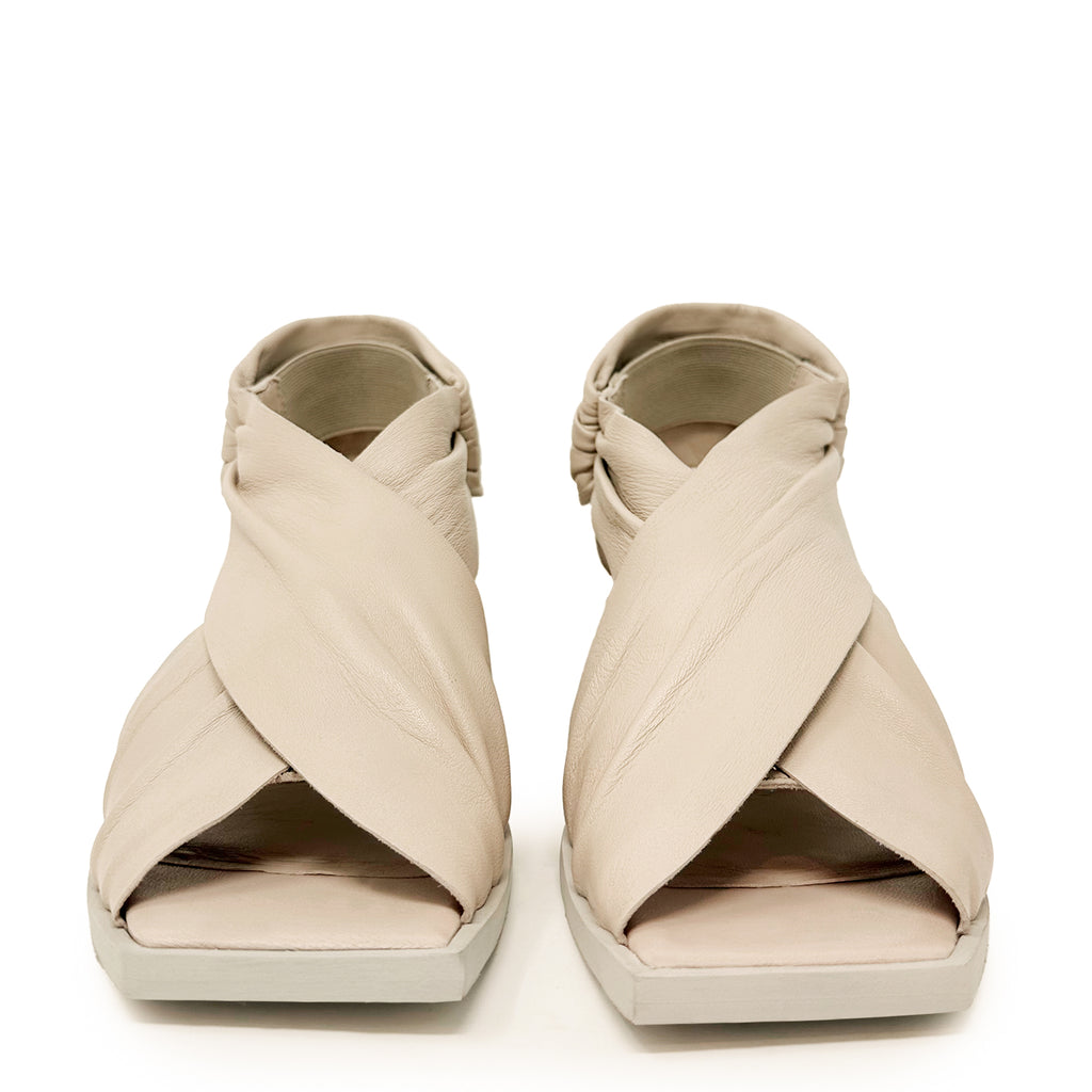 Daniella Shevel Harper Wrap leather heel sandal in stone white front view