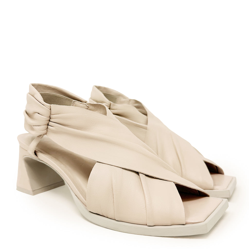 Daniella Shevel Harper Wrap leather heel sandal in stone white side angle pair