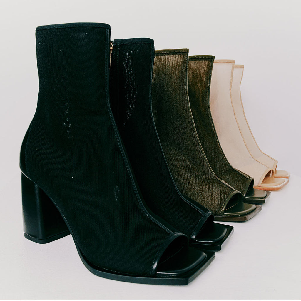 Daniella Shevel Onyx ankle boots in camel, black, and olive, displayed to show their premium material and design.