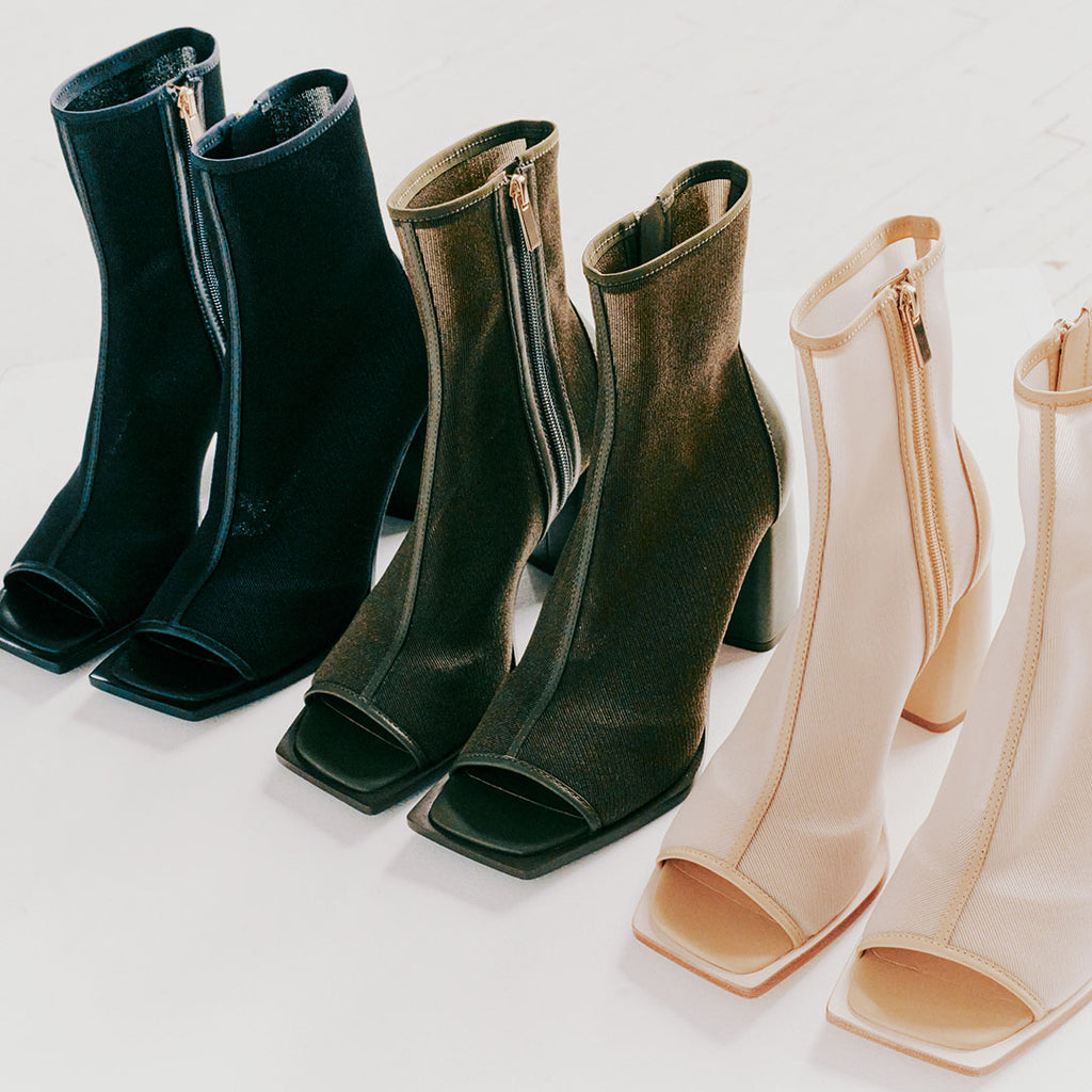 Daniella Shevel Onyx ankle boots in camel, black, and olive, highlighting their versatile color options and timeless design.