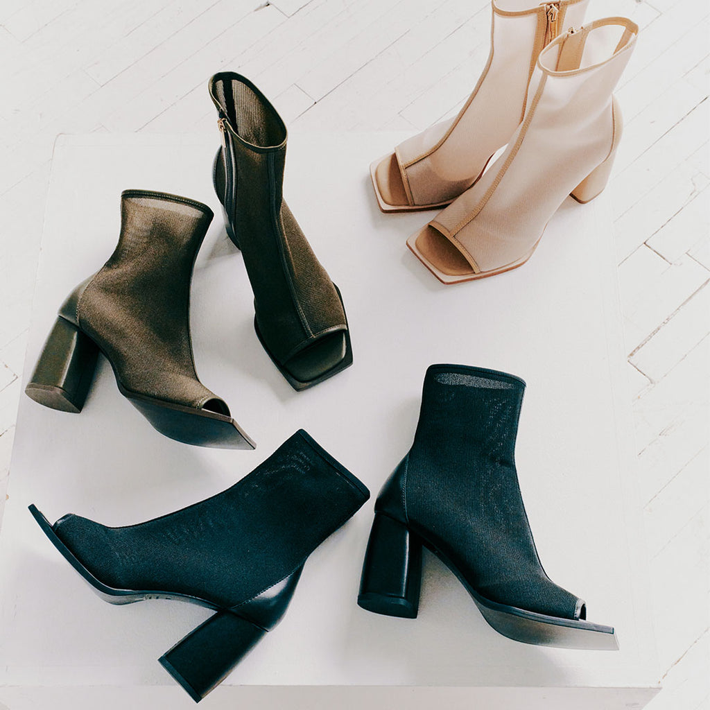 Daniella Shevel Onyx boots in black, camel, and olive displayed together, highlighting versatile styling options.