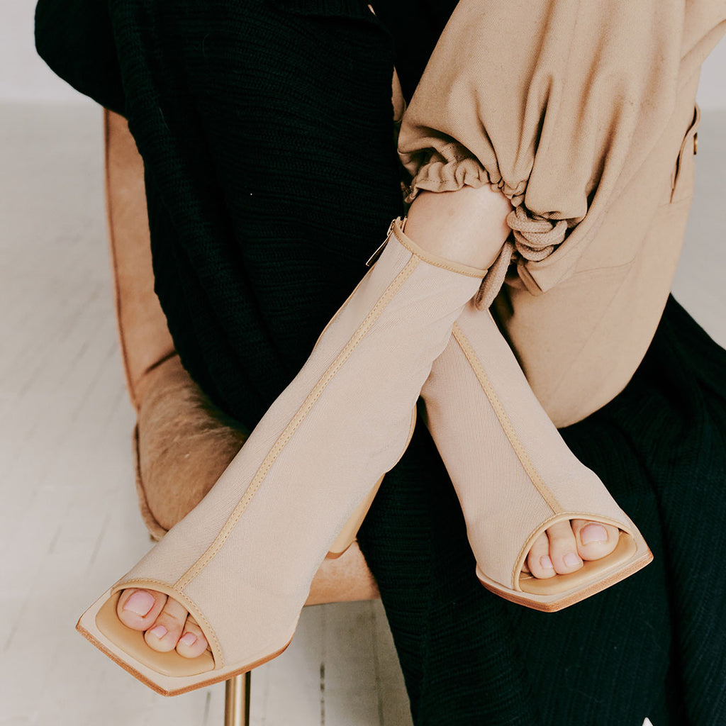 Detailed view of Daniella Shevel Onyx open-toe ankle boots in camel, highlighting the mesh and leather upper with a square toe.