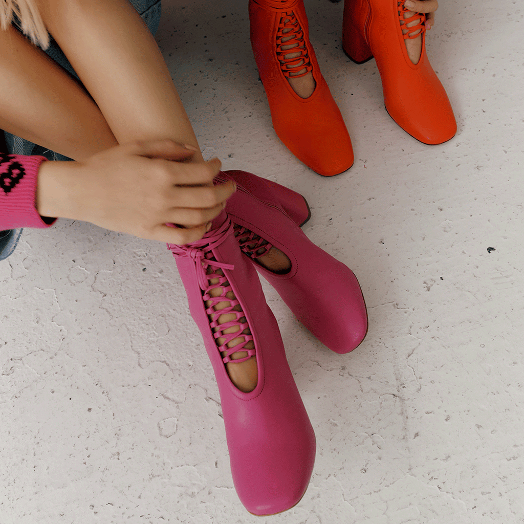 Daniella Shevel Belladonna Lace up boot in intense pink and Belladonna in lobster red lacing details