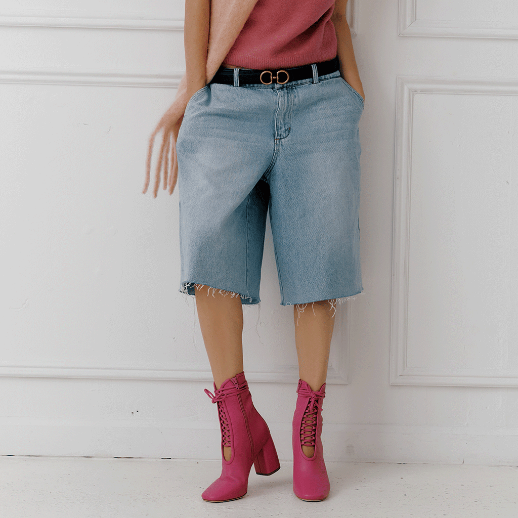 Daniella Shevel Belladonna Lace up boot in intense pink frontview in fall styling with scarf and sweater and jeans