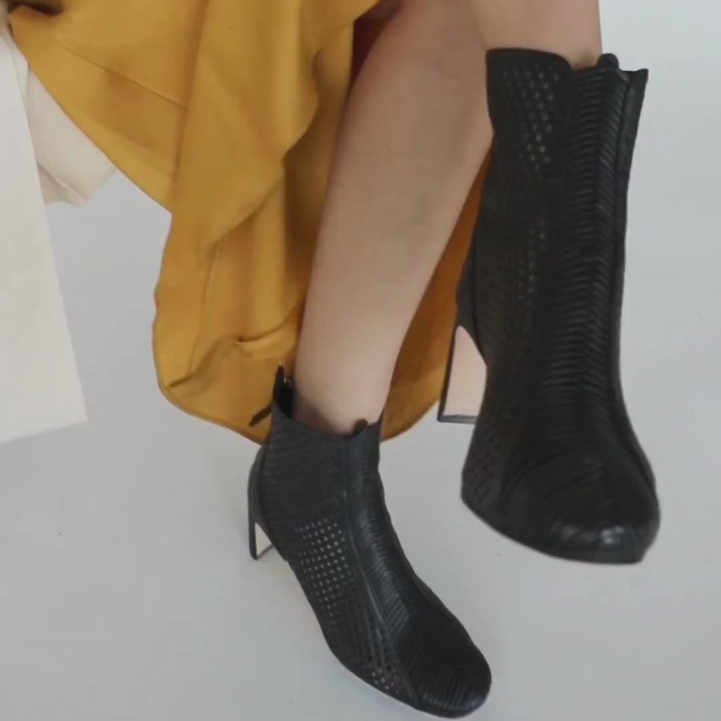 Daniella Shevel Isabella Woven leather Bootie styled in midi dressn