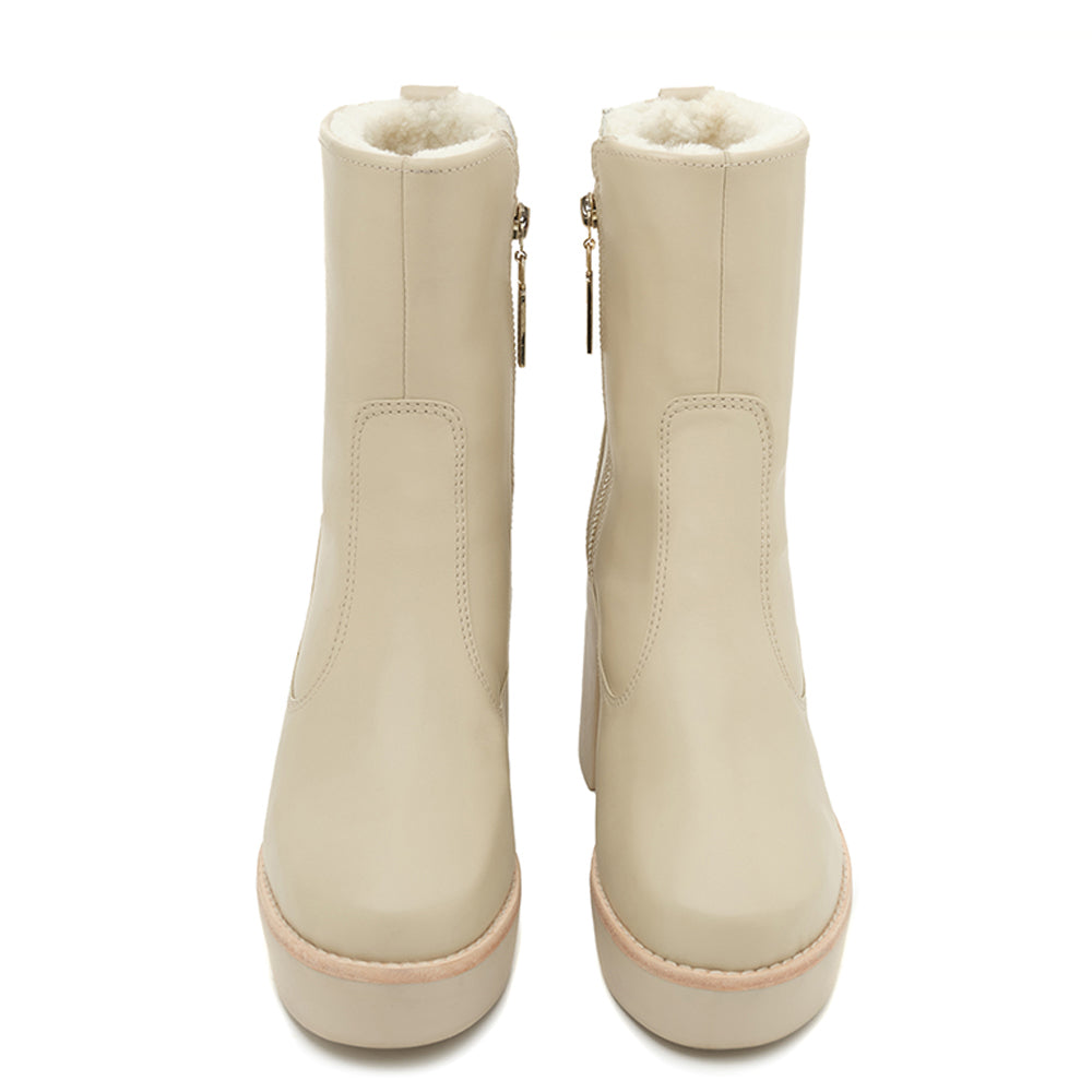 Daniella Shevel Aspen Shearling Sherpa lined boot with rubber lugg sole in creamy stone white leather front full pair view