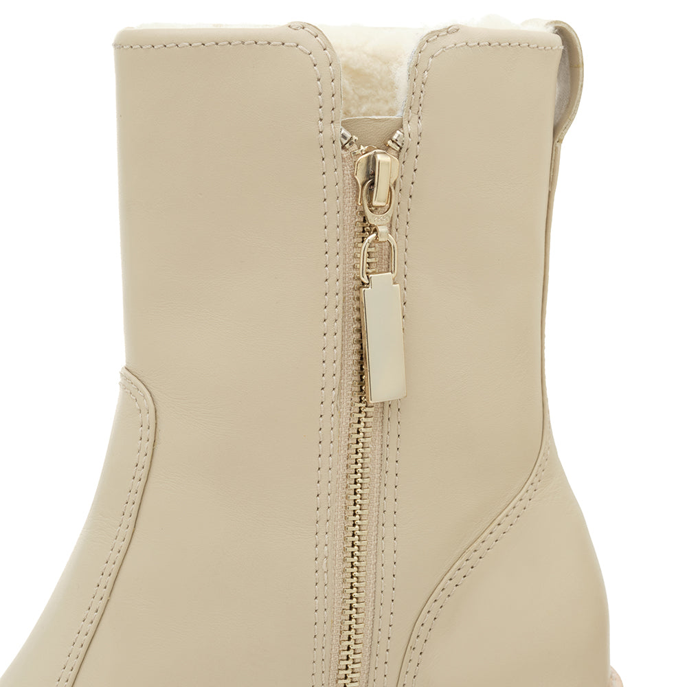 Daniella Shevel Aspen Shearling Sherpa lined boot with rubber lugg sole in creamy stone white leather inside zipper view