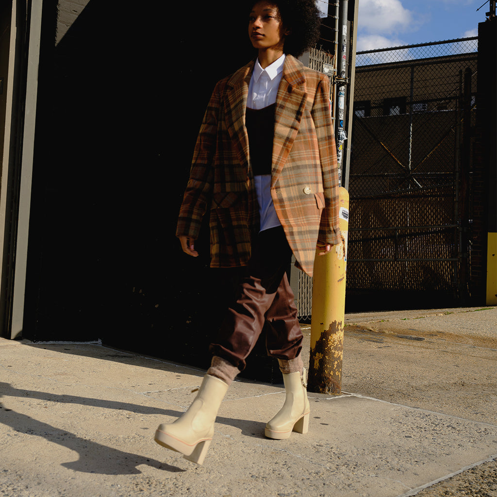 Daniella Shevel Aspen Shearling Boot waterproof and weatherproof with rubber lugg sole with plaid jacket in Queens New York