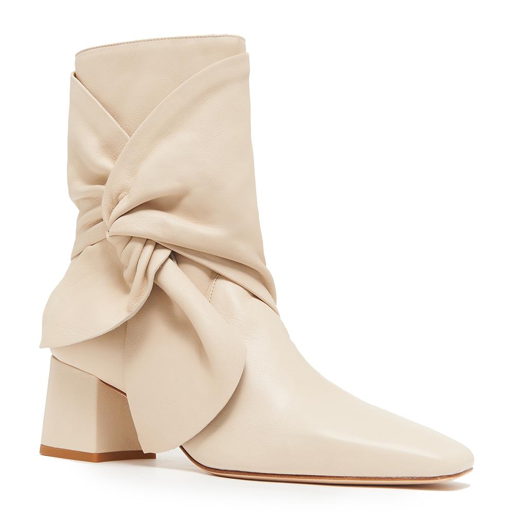 Daniella Shevel Bonnie Bow Tie Bootie side angle view in Stone White Cream