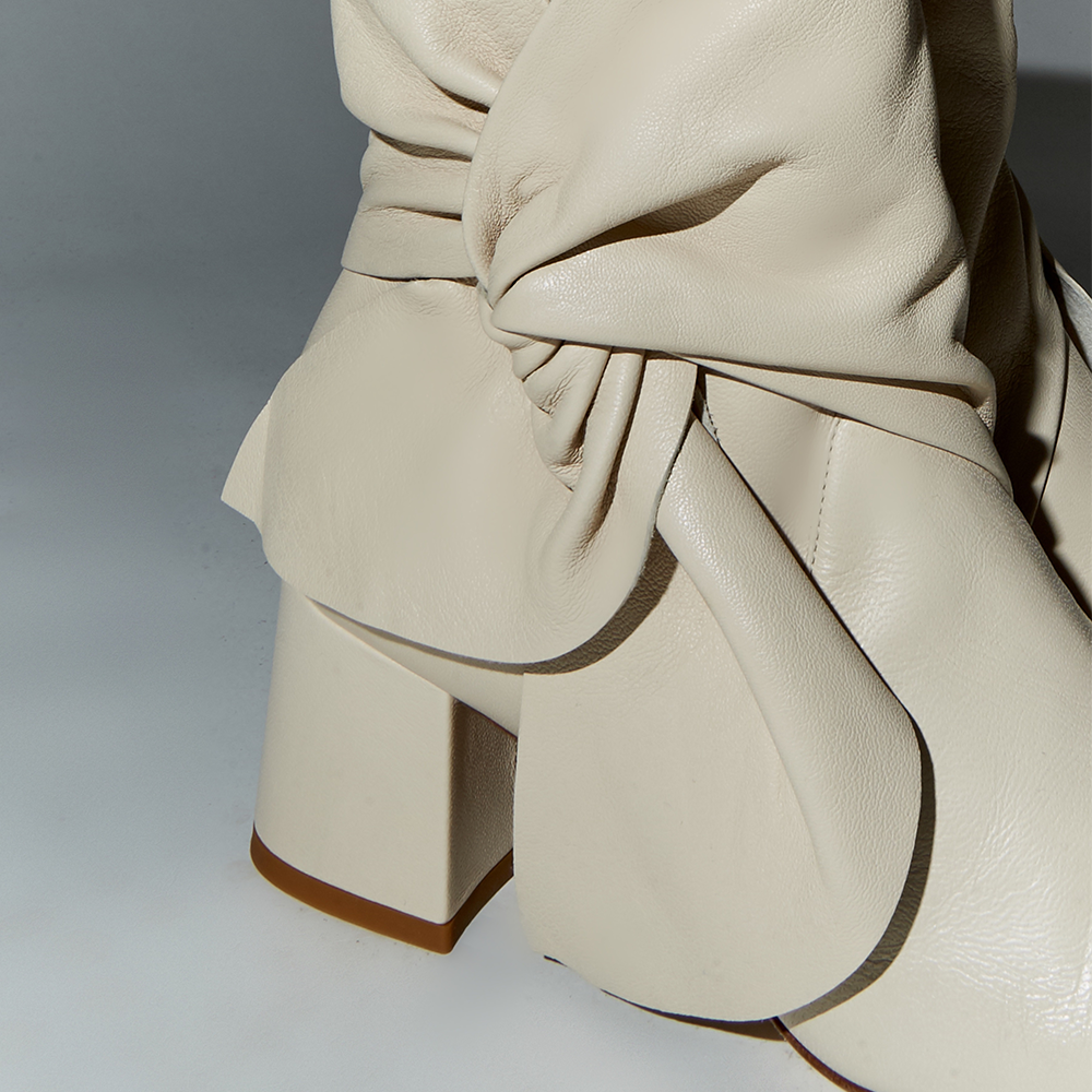 Daniella Shevel Bonnie Bow Tie Bootie detail close up in Stone White Cream