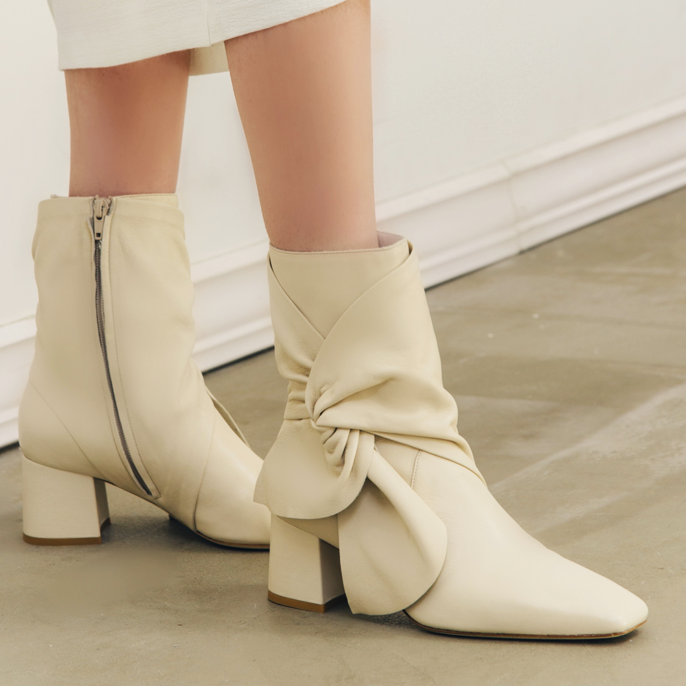 Daniella Shevel Bonnie Bow Tie Bootie  in Stone White Cream with White Skirt