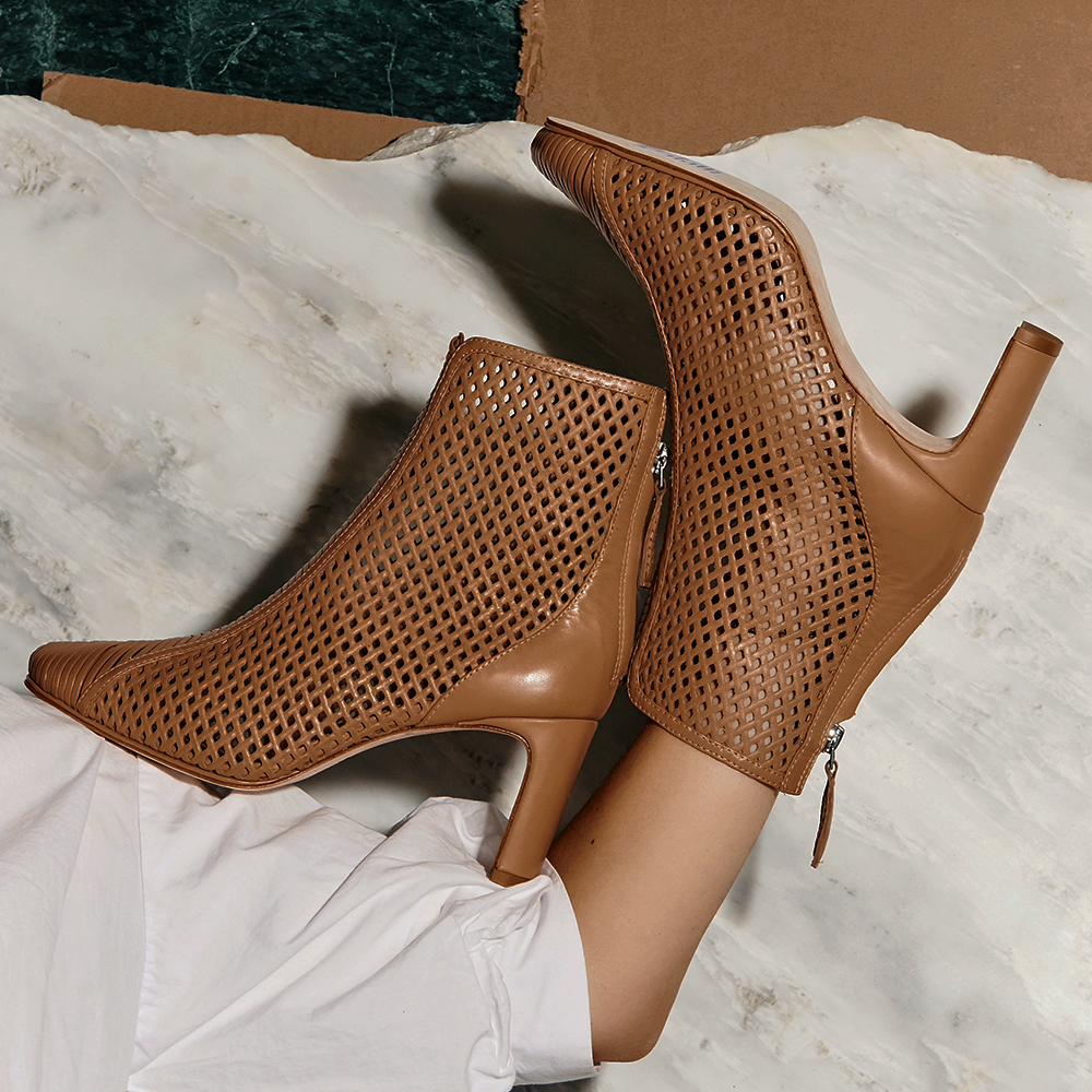 Daniella Shevel Isabella Cream Camel Bootie with leather mesh and woven details help up by arm art