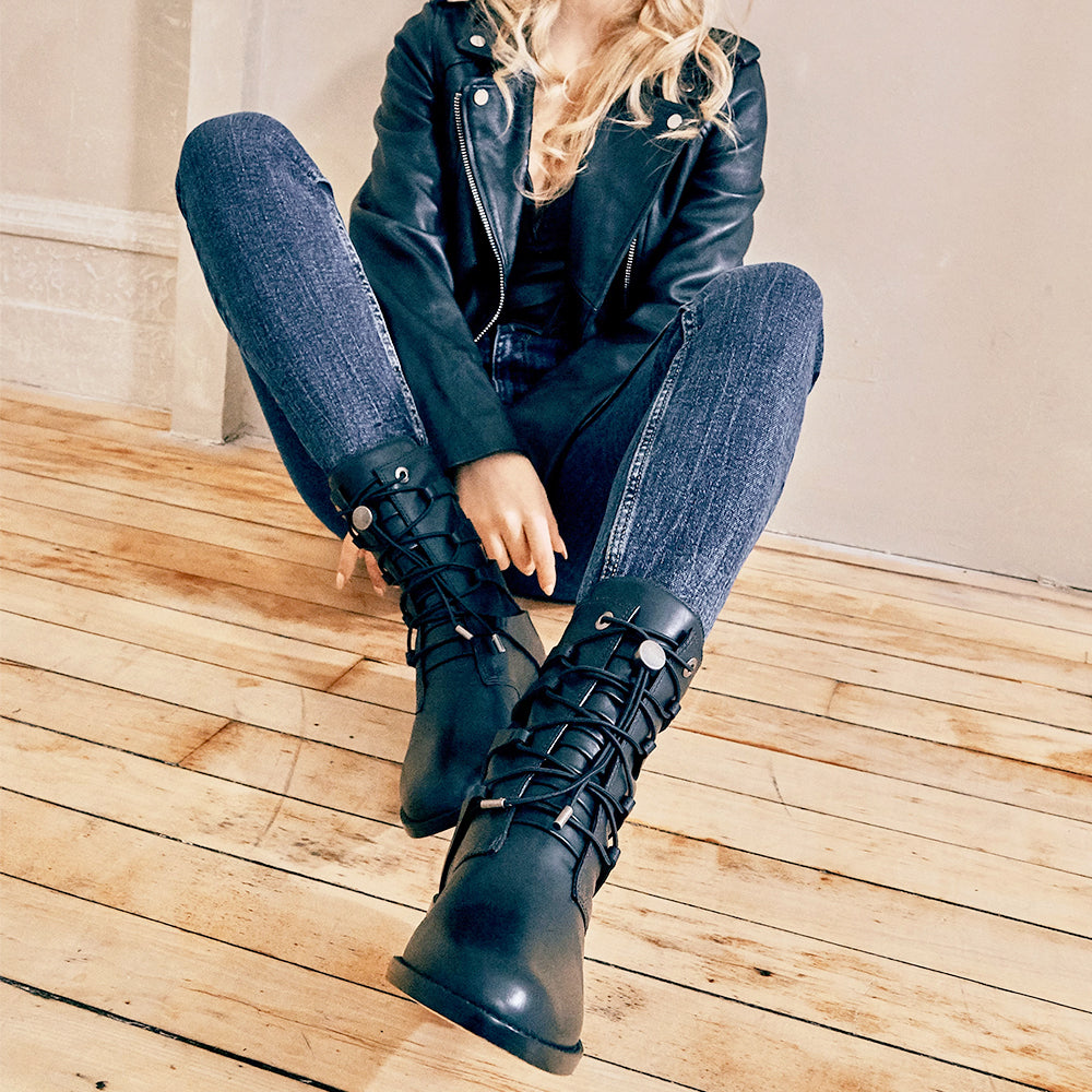 Daniella Shevel black moss boot with leather jacket and denim