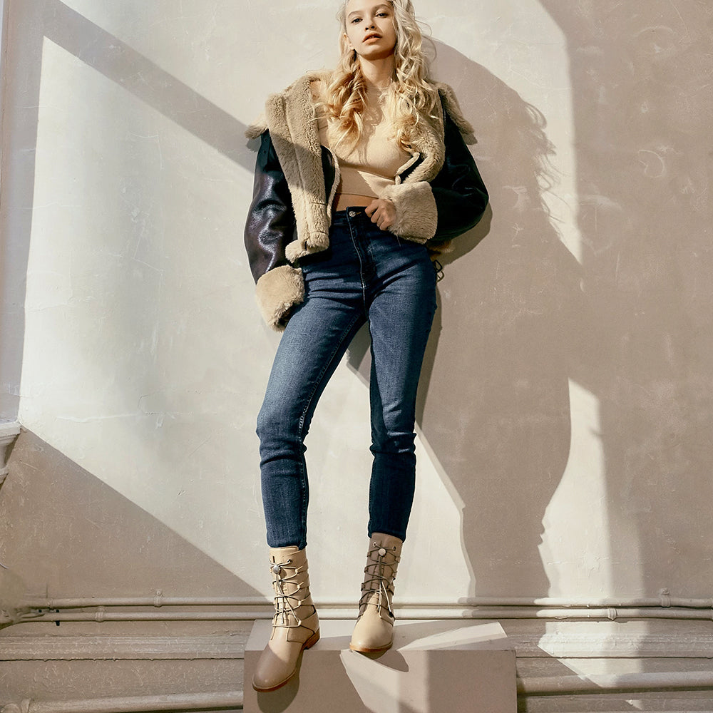 Daniella Shevel cream camel moss boots with denim jeans and faux fur jacket