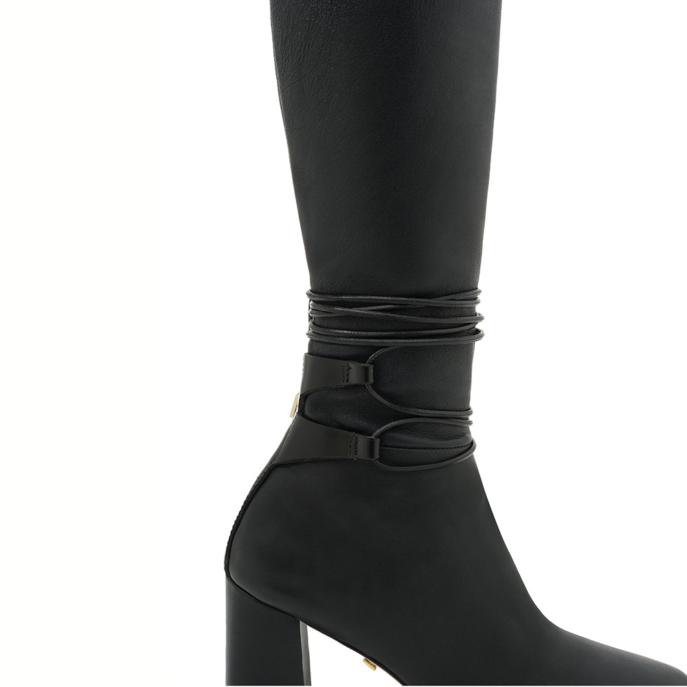 Daniella Shevel Black Tall Shaft Boot in Black Leather stretch side view with laces tied