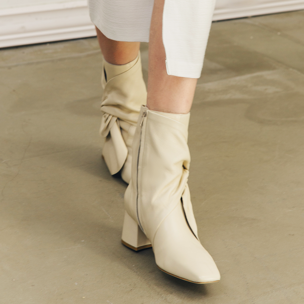 Daniella Shevel Bonnie Bow Tie Bootie detail close up in Stone White Cream Walking Boot