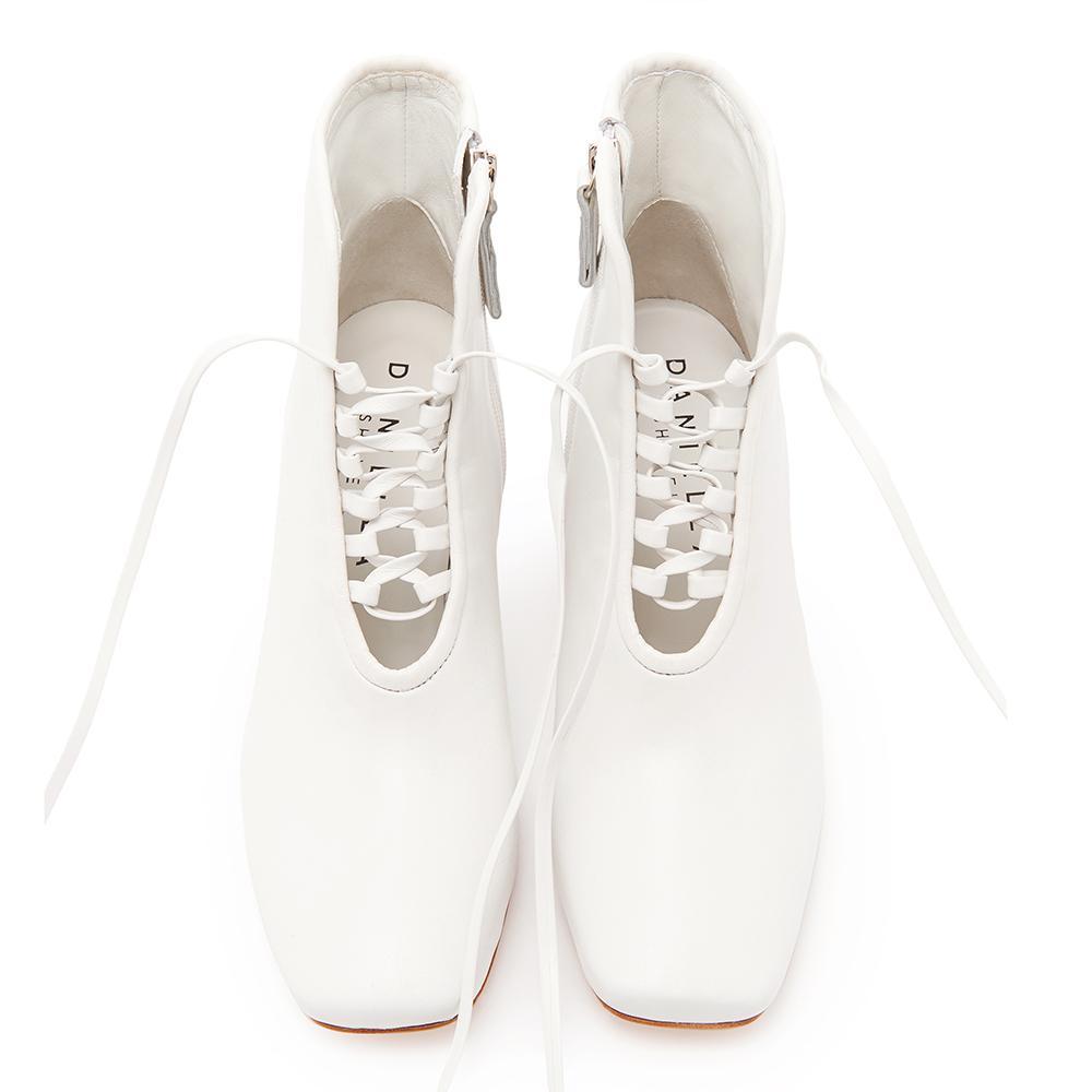 Daniella Shevel Cleo White Leather Bootie with Low Heel and White Laces Front View