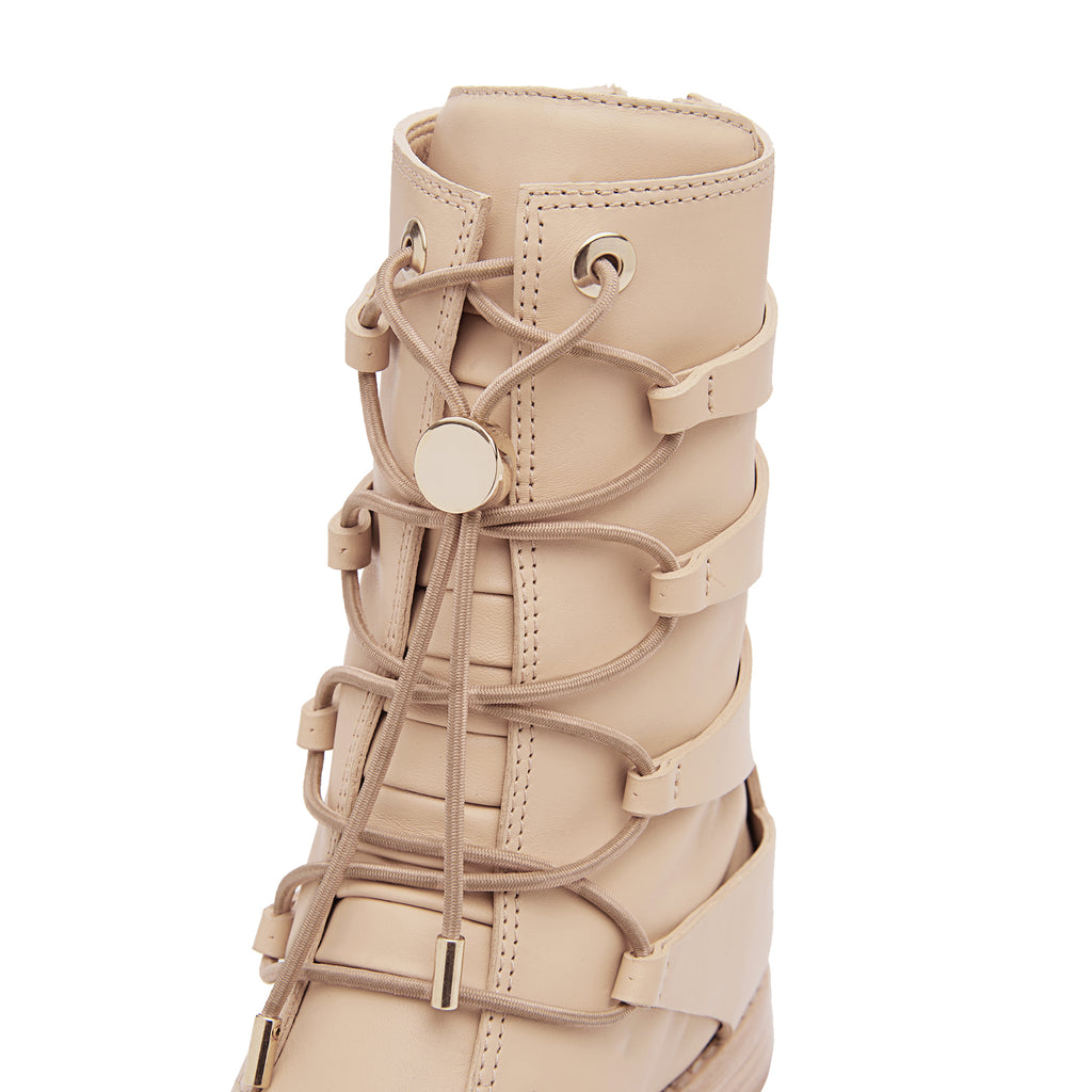 Daniella Shevel Moss Motorcycle Boot in Light Cream Camel With Gold hardware adjustable stretch laces and leather cut outs close up